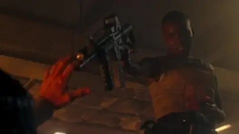 Still 7 of Copshop (2021) BluRay [Hindi (ORG 2.0) + English] 1080p 720p & 480p Dual Audio [x264/10Bit-HEVC]